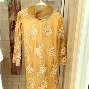 Beautiful golden smock with pants and wrap
